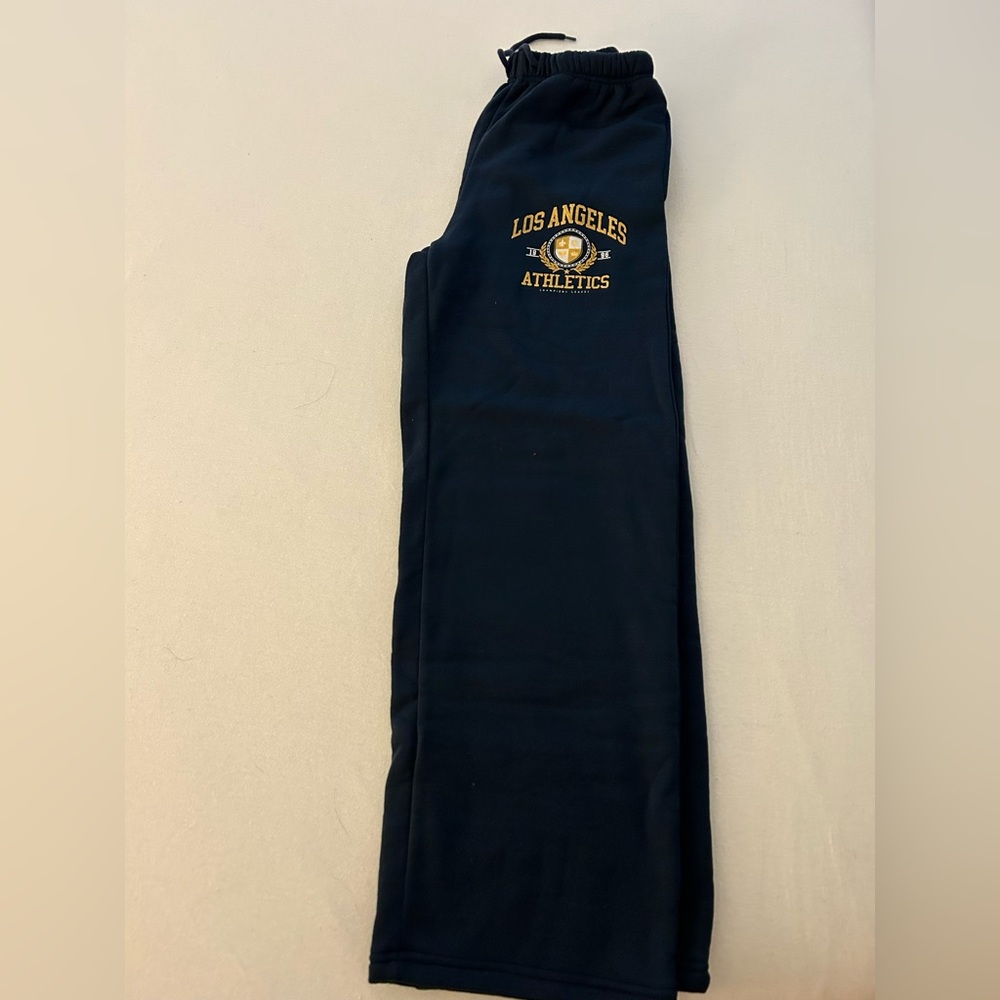 Navy blue and yellow sweat pants